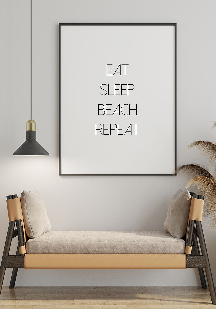 personalisierbares Poster eat sleep repeat über dem Sofa